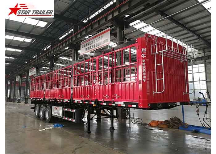 China Cargo Stake Side Wall Semi Trailer 60T Heavy Duty Load With Longer Service Life wholesale