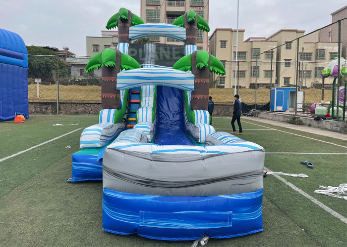 China Jungle Palm Tree Theme EN71 Inflatable Water Slide With Pool wholesale