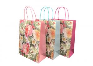 China Exquisite Sustainable Promotional Paper Gift Bags Flower Pattern Design on sale
