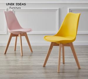 China Nordic Plastic Wooden Dining Chairs Seat Yellow Tulip Dining Chairs wholesale
