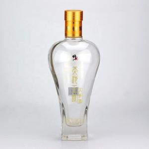 China Glass Sealing Type CROWN CAP 500ml 750ml Ginseng Liquor Bottle From Medicated Liquor on sale