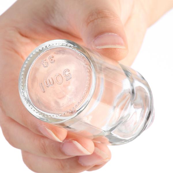 50ml/100ml Glass Perfume Bottle with CROWN CAP Sealing Type and Transparent Empty Design