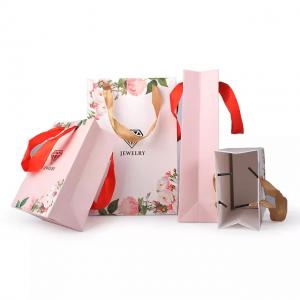 China Custom Printed Ribbon Handle Craft Gift Jewelry Paper Bag wholesale