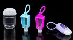 China Pet 30Ml Silicone Sleeve Empty Keychain Bottles Smooth For Hand Santizer on sale