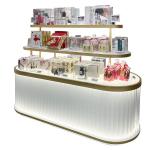 China Creative Multi Level Acrylic Cosmetic Display Cabinet Oval Glowing Shop Display Shelf for sale