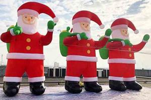 China Giant Inflatable Santa Claus Yard Christmas Decoration Blow Up Santa Inflatables wholesale