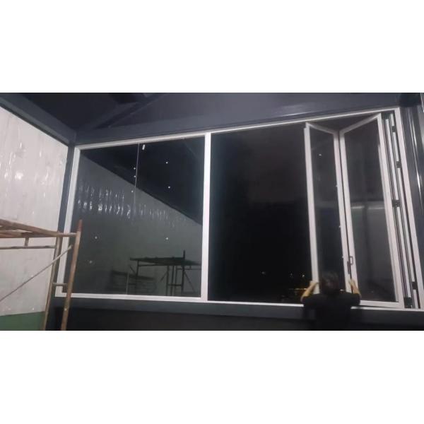 EcoBreath Sustainable Folding Window with Built-in Air Purifying Moss Panels for Urban Pollution Reduction