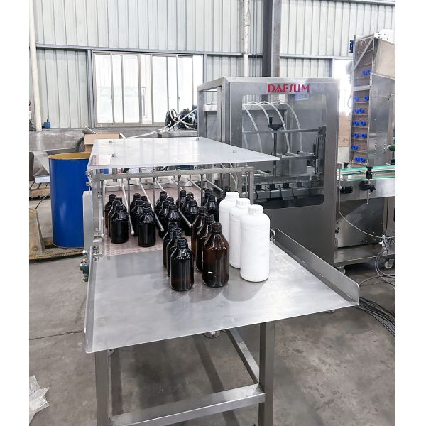 250-500ml Fully Automatic Small Bottle Filling Machine with SS304/SS316 Construction and 1000-2000 BPH Speed