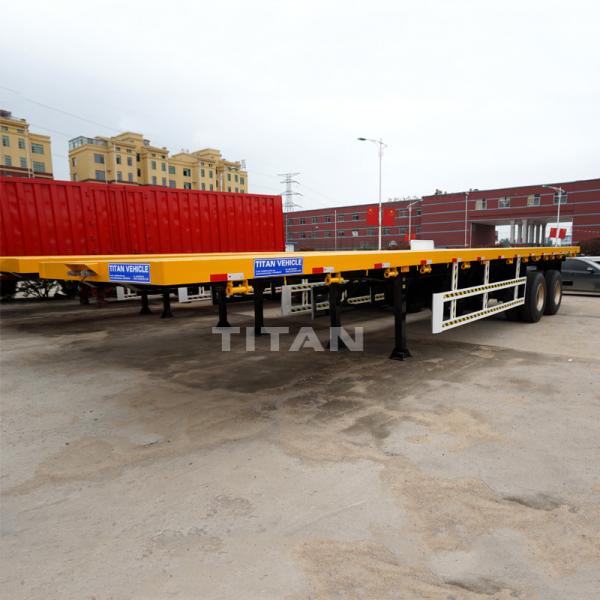 Quality 20ft 40ft shipping container transport trailer tri axle flatbed container semi trailer 40 feet container flatbed trailer for sale