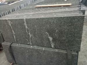 China Different Color Control Natural Stone Slabs Black Granite With White Vein Material wholesale